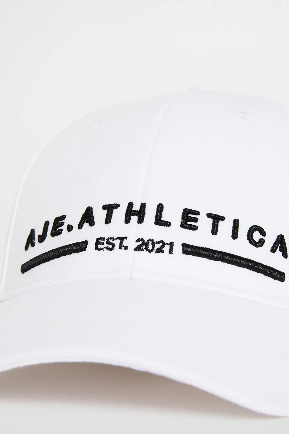 stacked_logo_cap__2.webp Best Aje ATHLETICA Stacked Logo Cap 901 White/Black Logo