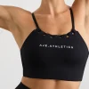 Shop Aje ATHLETICA Thread Through Sports Bra 361 Black/White Logo