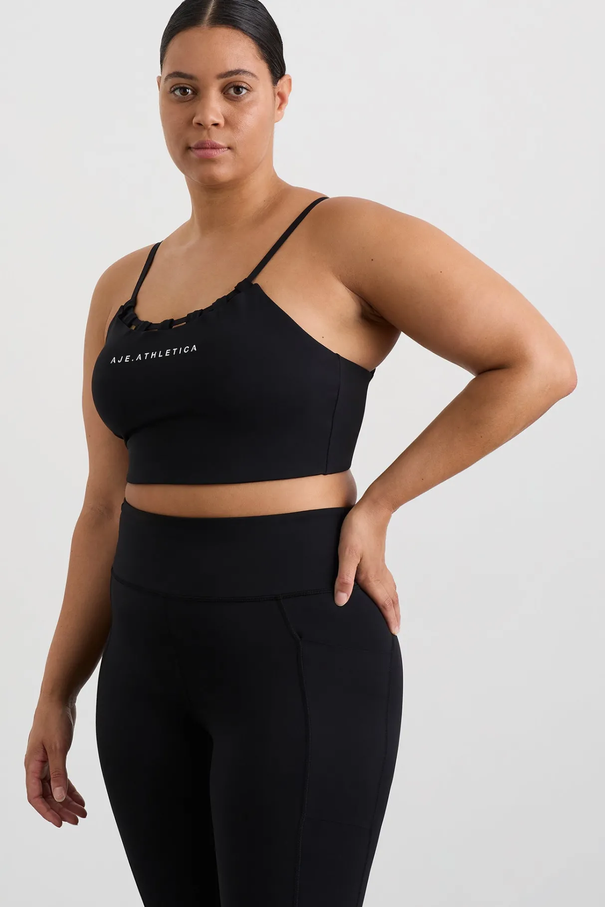 thread_through_sports_bra__11.webp Shop Aje ATHLETICA Thread Through Sports Bra 361 Black/White Logo