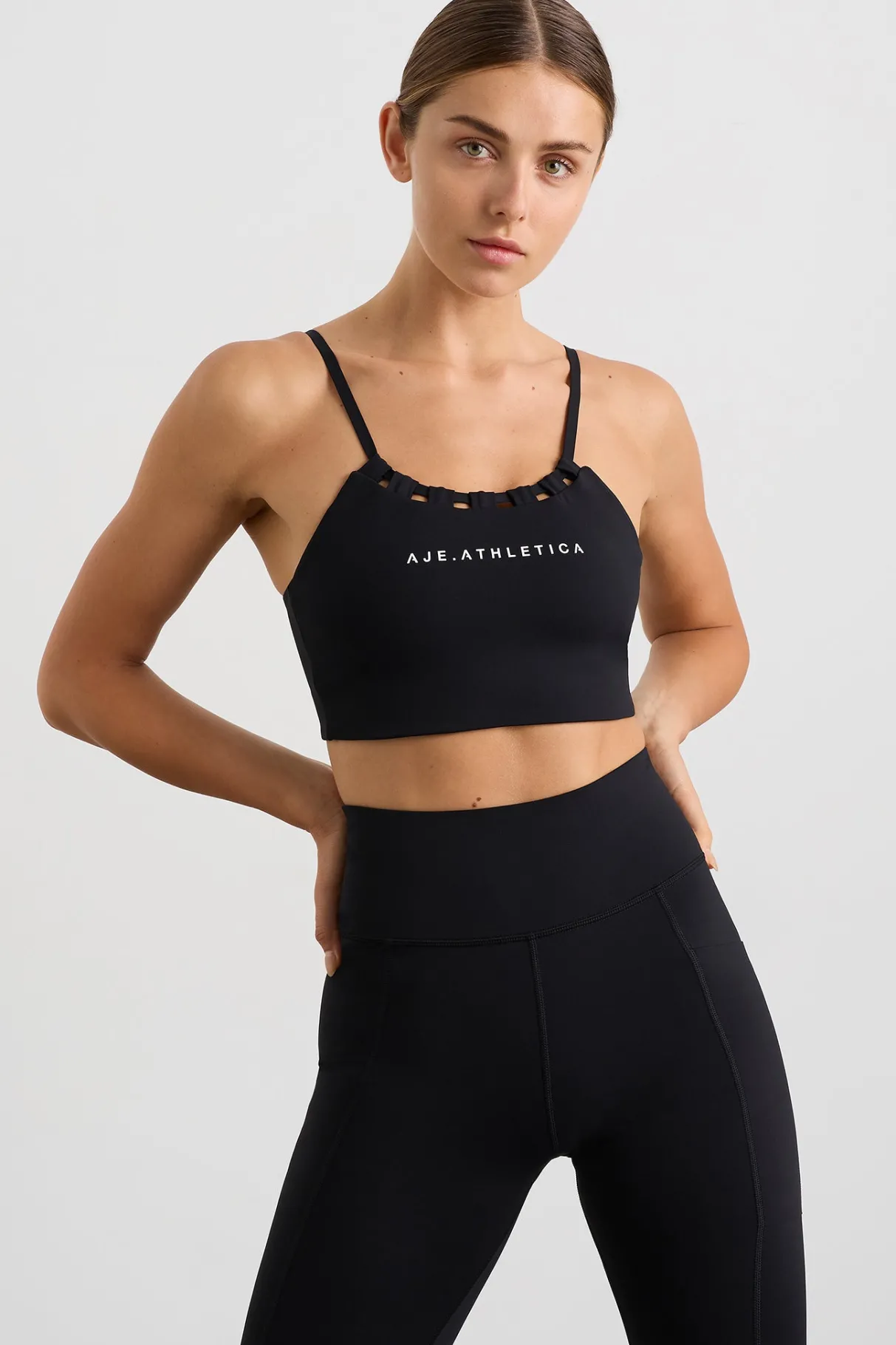 thread_through_sports_bra__4.webp Shop Aje ATHLETICA Thread Through Sports Bra 361 Black/White Logo
