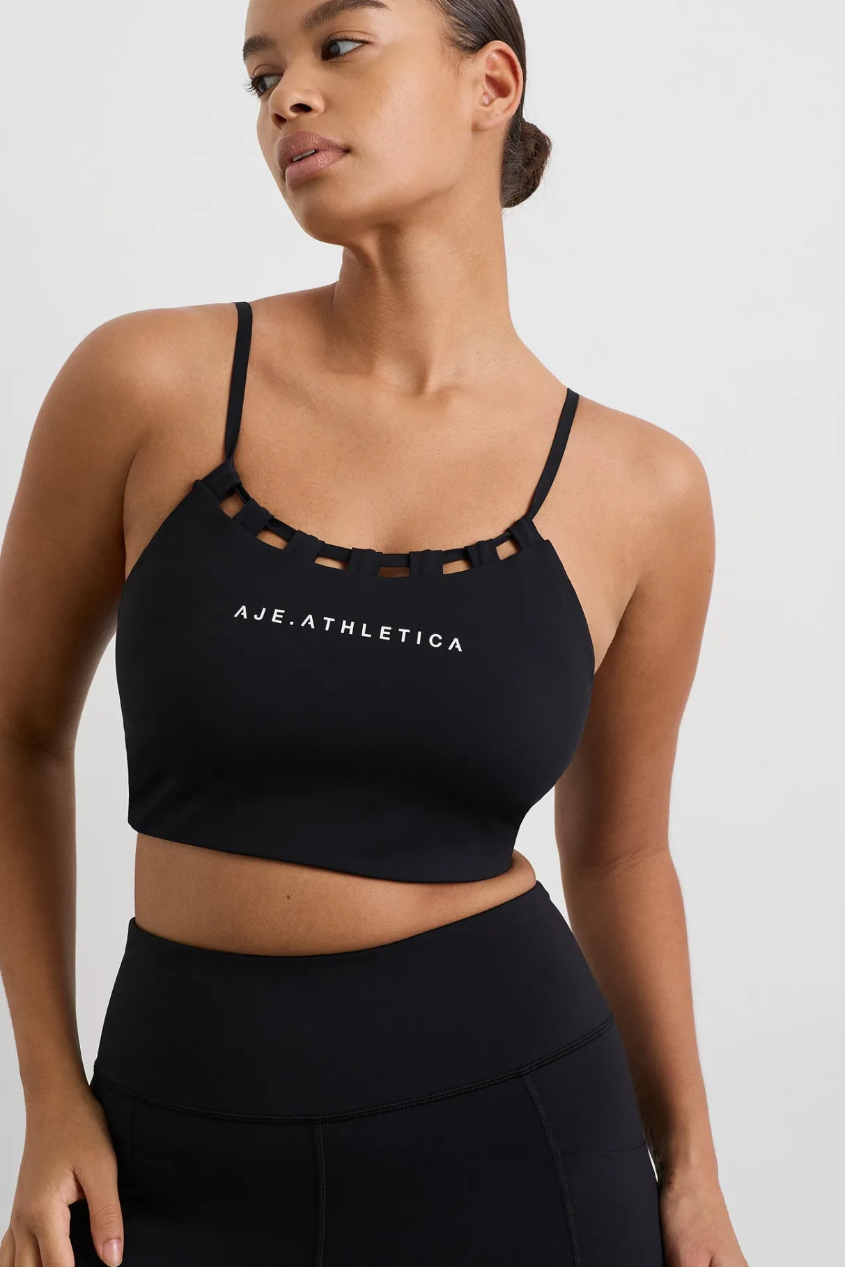 thread_through_sports_bra__9.webp Shop Aje ATHLETICA Thread Through Sports Bra 361 Black/White Logo
