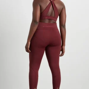 Store Aje ATHLETICA Twist Back Sports Bra 335 Burnt Burgundy/Berry