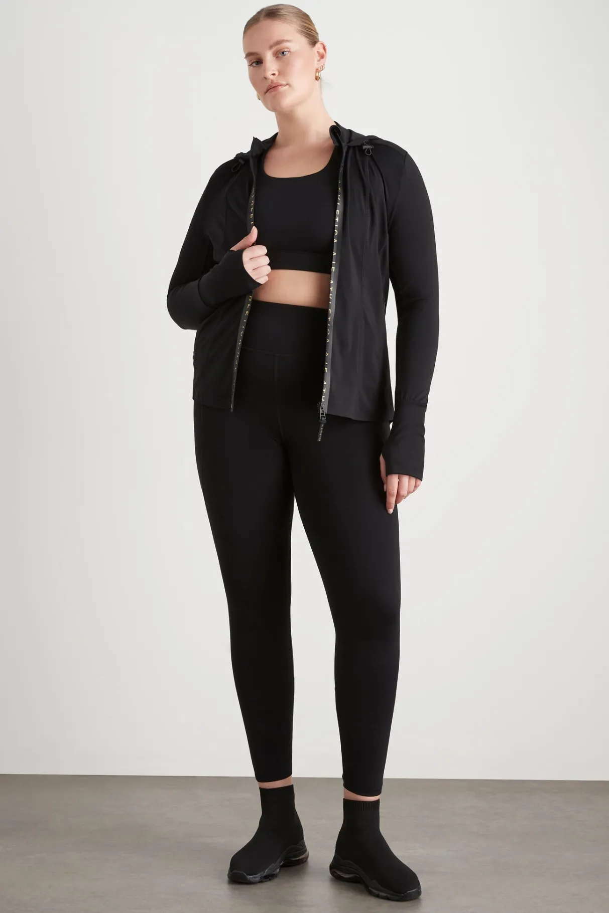 twist_back_sports_bra__14-1.webp Fashion Aje ATHLETICA Twist Back Sports Bra 335 Black/Gold