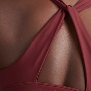 Store Aje ATHLETICA Twist Back Sports Bra 335 Burnt Burgundy/Berry