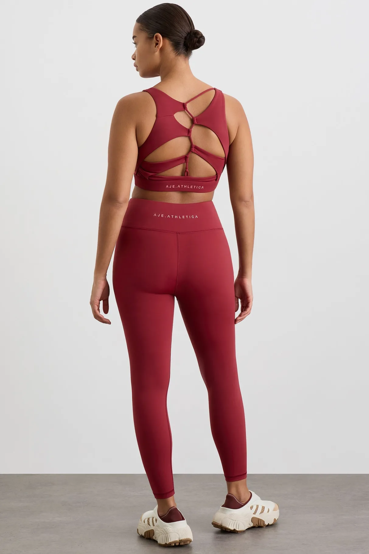 winding_road_high_neck_bra__10-1.webp Discount Aje ATHLETICA Winding Road High Neck Bra 364 Plum Red