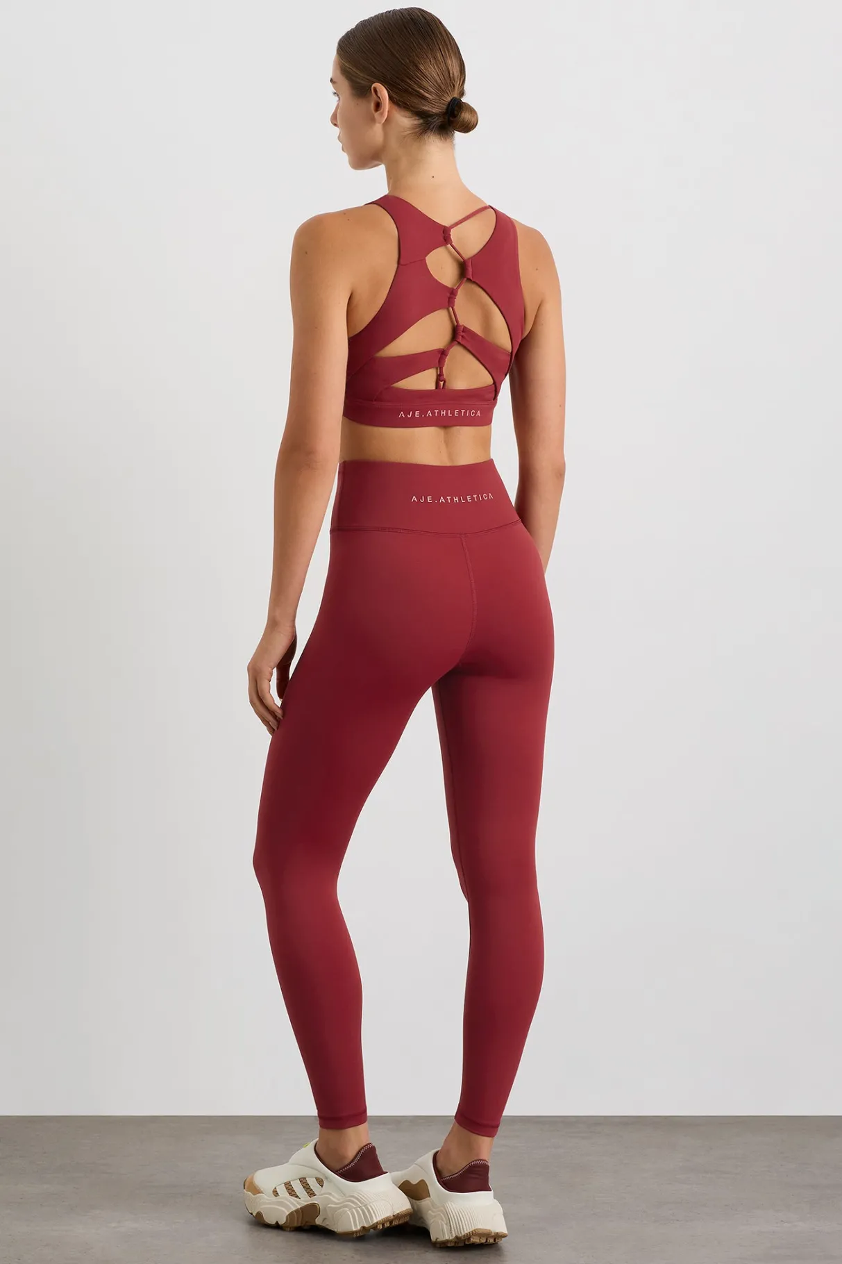 winding_road_high_neck_bra__5-1.webp Discount Aje ATHLETICA Winding Road High Neck Bra 364 Plum Red