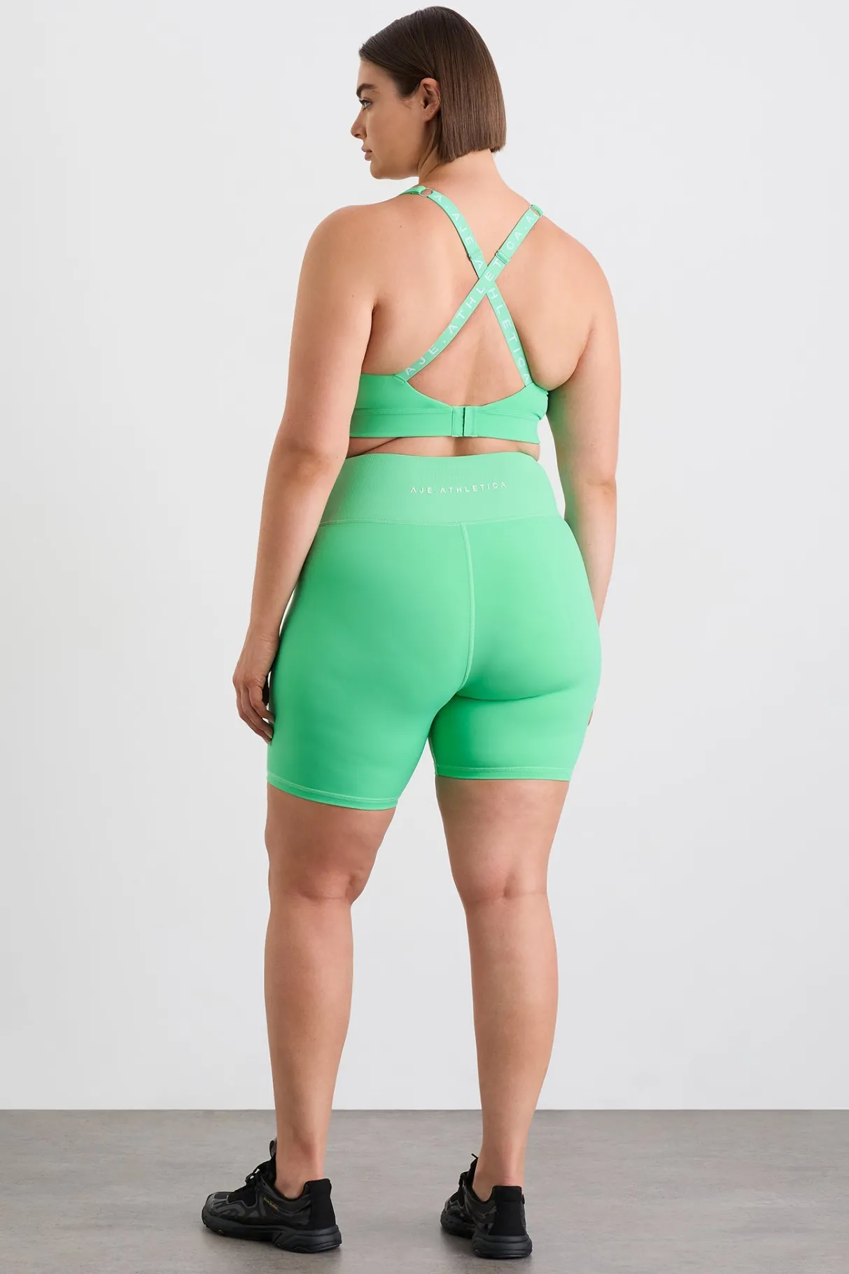 wrap_front_bike_short__16.webp Clearance Aje ATHLETICA Wrap Front Bike Short 614 Marine Green